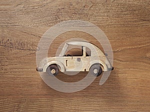 Wooden car toy with curvy shape