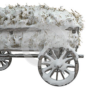 Wooden cart with hay covered in snow