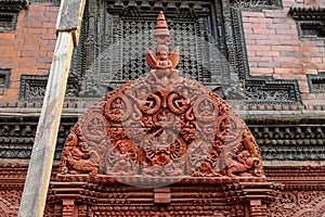 Wooden carved decorations on Kumari Ghar Palace in Kathmandu photo