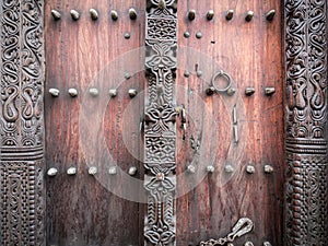 Wooden carved door in Stone Town, Zanzibar