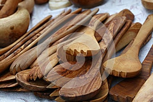 Wooden carved natural utensils on market stall