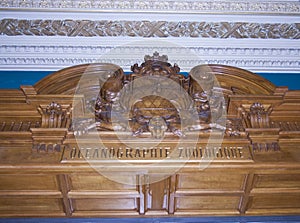 Wooden carving above the entry