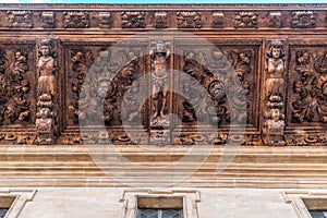 Wooden carving roof detail of city hall ajuntament de Palma from Plaza de Cort square.