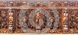 Wooden carving roof detail of city hall ajuntament de Palma from Plaza de Cort square.