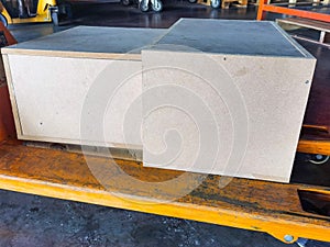 Wooden case shipment and wood box on hand lift pallet in cargo warehouse and ready loading to container truck for transportation
