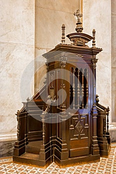 Wooden Catholic confessional photo