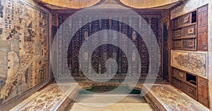 Wooden ceiling decorated with floral pattern decorations and mural at historic Beit El Set Waseela building, Old Cairo, Egypt photo