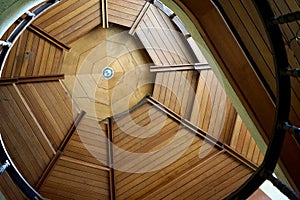 Wooden ceilings of rotary stairs.