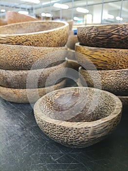 Wooden and ceramic bowls on a shop display