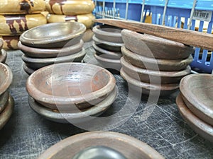 Wooden and ceramic bowls on a shop display