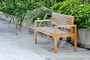 Wooden Chair on the cement floor .