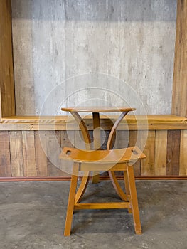 Wooden chair decorated in coffee shop