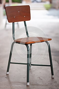 Wooden chair decorated in coffee shop