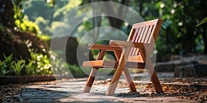 Wooden chair in the garden for relaxation and tranquility with the surrounding plants blurred background