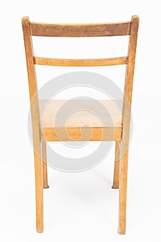 Wooden chair from turn of 70's and 80's from previous century in brown color. Polish design and production. Rear view