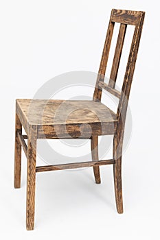 Wooden chair from turn of 70's and 80's from previous century with rustic color. Polish design and production. View from