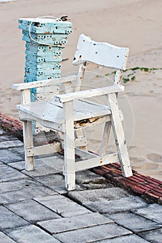 Wooden chair, white at the beach