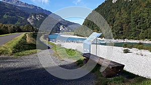 Wooden chairs along Rhine river in Mels Switzerland