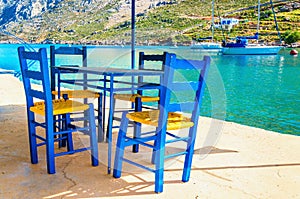 Wooden chairs in classic Greek resturant, Greece