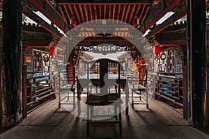 Wooden chairs and desk in Ancient wooden building in Pingyao old town, Shanxi Province of China, with Chinese decoration, architec