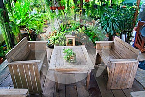 Wooden chairs and table in the garden