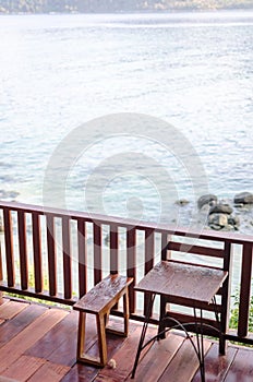 Wooden chairs and tables on the terrace