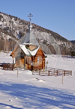 Wooden chapel in the Altai mountains - vertically
