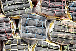 Wooden charcoal in sacks.