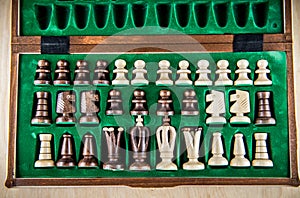 Wooden chess in a box, top view