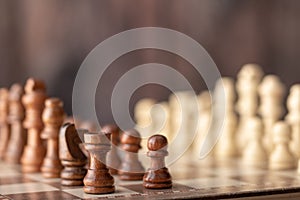 wooden chess endways on the board photo