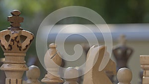 Wooden chess game on a table, fokus sharpness relocation