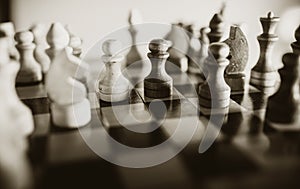 Wooden chess pieces on the chessboard