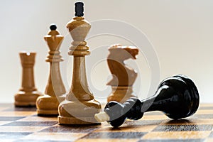 Wooden chess pieces closeup