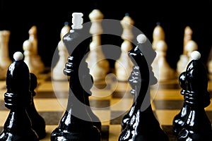 Wooden chess pieces closeup