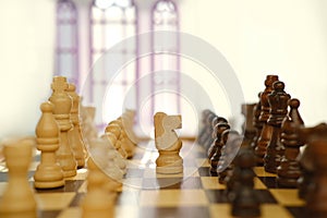wooden chess pieces, duel queen figures on chessboard blackboard, concept supreme power, victory, symbol superiority, level in