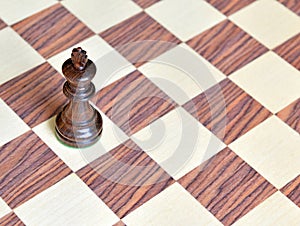 Wooden Chess pieces on wooden board