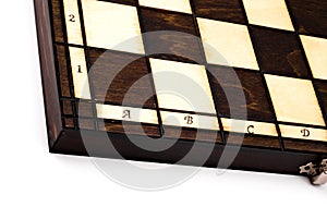 Wooden chessboard isolated on white