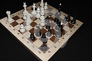 Wooden chessboard under white pawns for sport concept