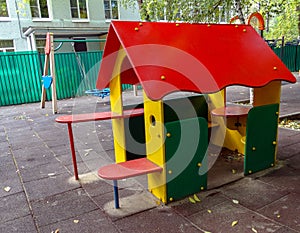 Wooden children`s house on the Playground of the kindergarten