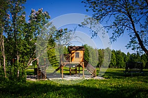 Wooden children`s Playground in nature in the eco-Park.