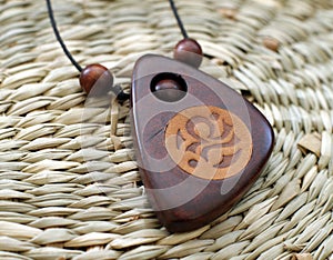 Wooden chineese amulet photo