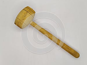 wooden and chop kitchen meat hammer on white background top view.