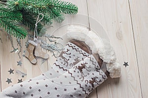 Wooden Christmas decorations - Christmas socks on a white wooden background with a Christmas tree
