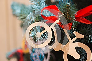 Wooden Christmas toy a bicycle on tree