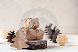 Wooden Christmas tree with gifts on a white background.Christmas new year