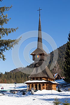 Wooden church in winter photo