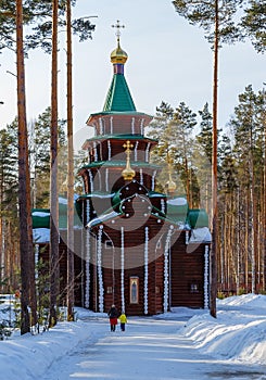 Wooden church in the woods in winter Ural Ekaterinburg Ganin Yama