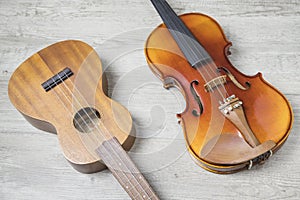 wooden classical guitar violin textured backdrop. High quality photo