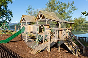 Wooden climbing frame for children in rural outdoor location