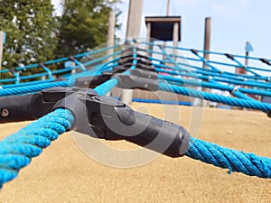 Wooden climbing frame on children`s playground